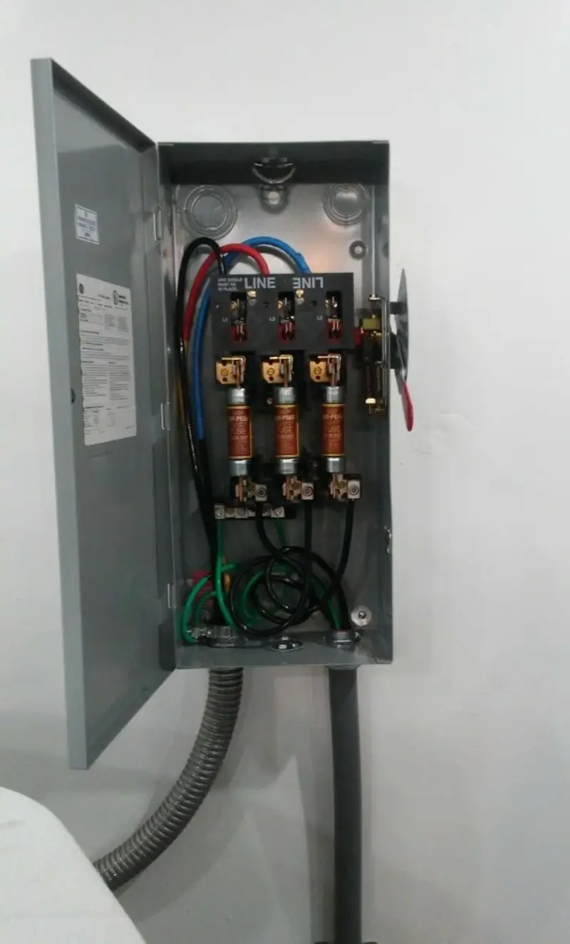 Three-phase disconnect switch installed for Smoke Detector Installation in The Crossings